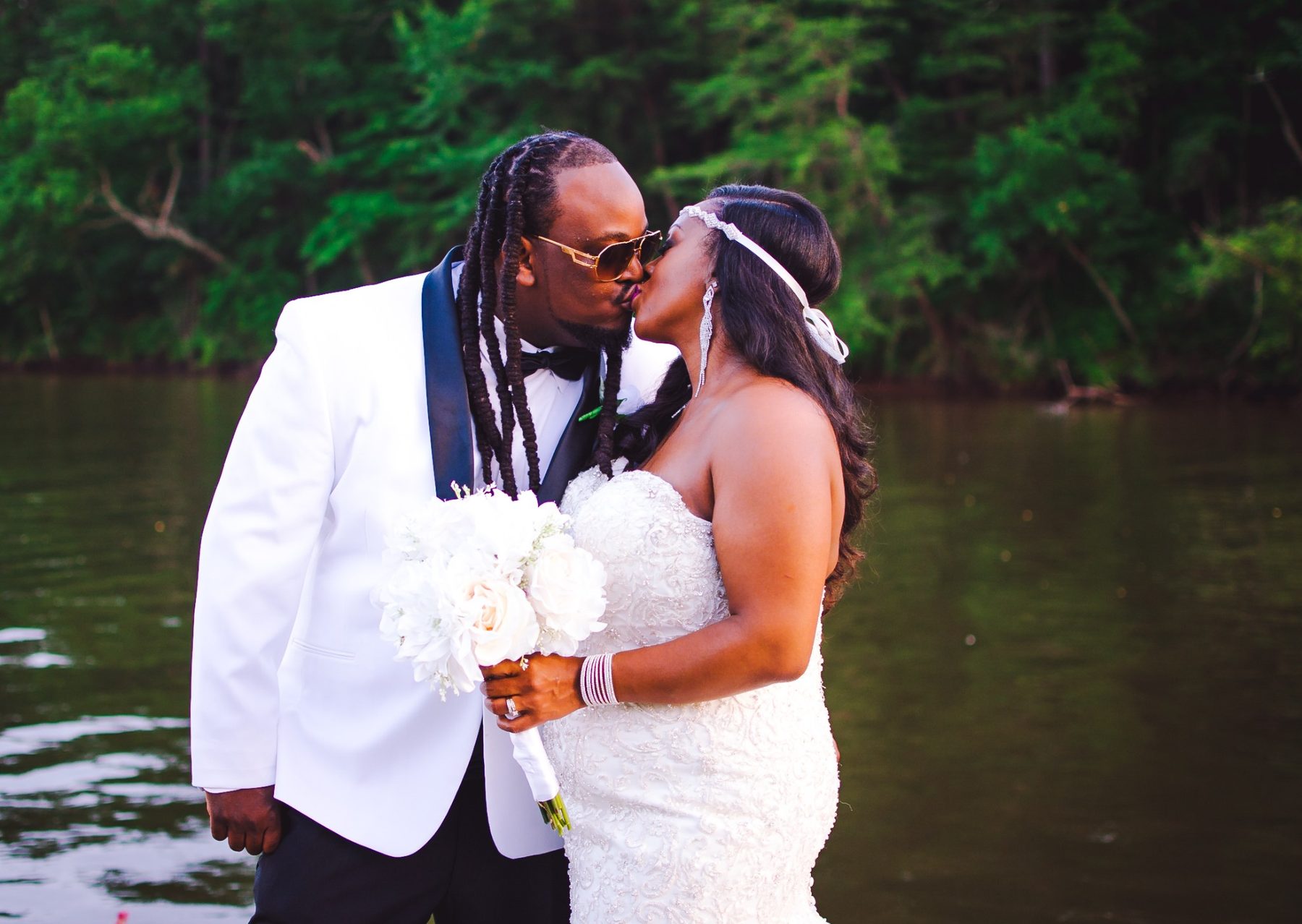 Wedding couple by water
